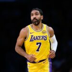 Oct 17, 2025; Los Angeles, California, USA; Los Angeles Lakers guard Gabe Vincent (7) looks on during the first half against the Sacramento Kings at Crypto.com Arena. Mandatory Credit: William Liang-Imagn Images