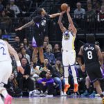 Jan 28, 2026; Salt Lake City, Utah, USA; Golden State Warriors forward Gui Santos (15) goes up for a shot against Utah Jazz guard Keyonte George (3) during the first half at Delta Center. Mandatory Credit: Rob Gray-Imagn Images