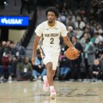Jan 25, 2026; San Antonio, Texas, USA; New Orleans Pelicans forward Herbert Jones (2) dribbles up the court in the second half against the San Antonio Spurs at Frost Bank Center. Mandatory Credit: Daniel Dunn-Imagn Images