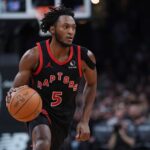 Jan 9, 2026; Boston, Massachusetts, USA; Toronto Raptors guard Immanuel Quickley (5) returns the ball against the Boston Celtics in the second half at TD Garden. Mandatory Credit: David Butler II-Imagn Images