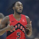 Nov 13, 2025; Cleveland, Ohio, USA; Toronto Raptors guard Immanuel Quickley (5) celebrates his three-point basket in the first quarter against the Cleveland Cavaliers at Rocket Arena. Mandatory Credit: David Richard-Imagn Images