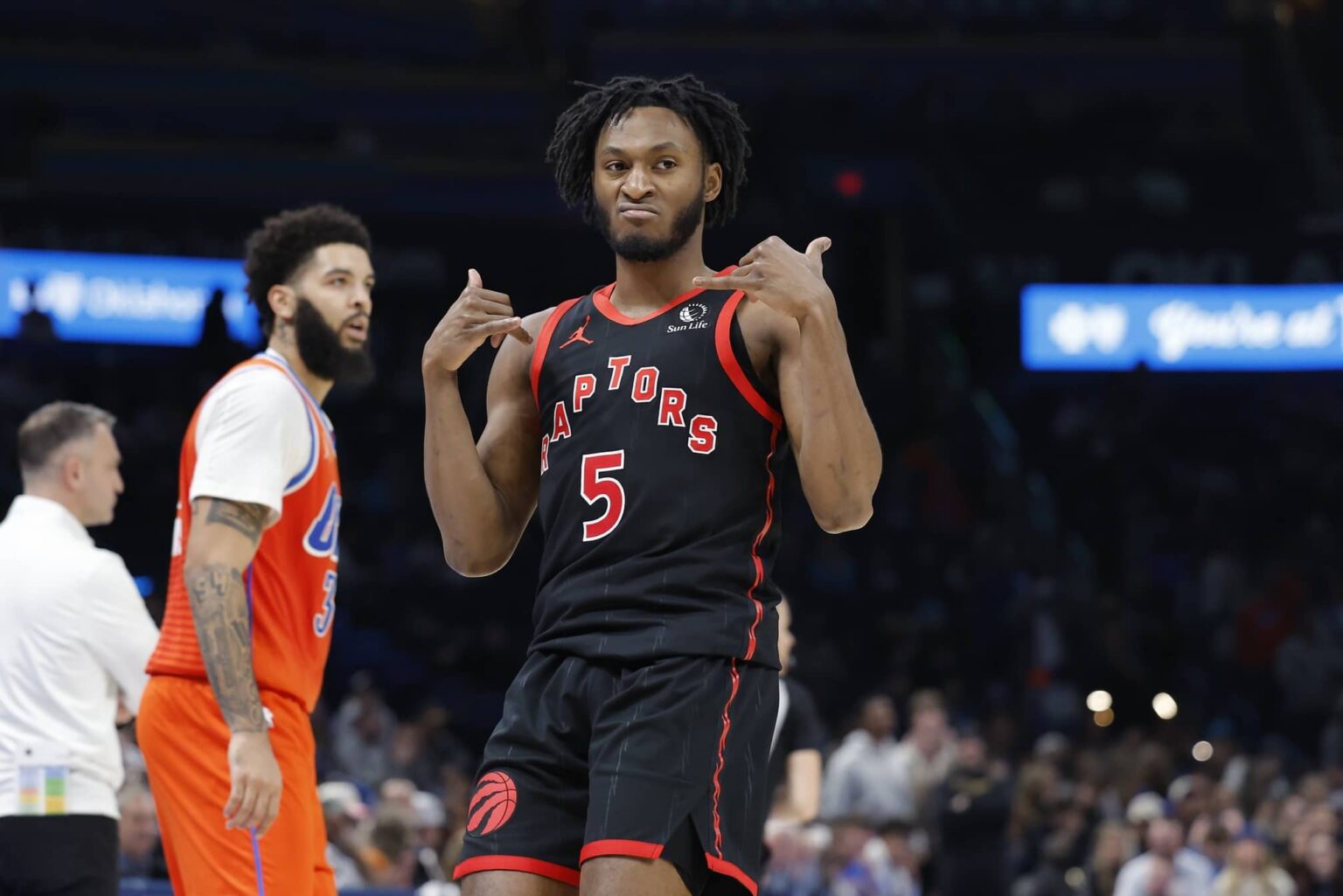 Jan 25, 2026; Oklahoma City, Oklahoma, USA; Toronto Raptors guard Immanuel Quickley (5) gestures after scoring a three point basket against the Oklahoma City Thunder during the second half at Paycom Center. Mandatory Credit: Alonzo Adams-Imagn Images