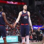 Dec 11, 2025; Houston, Texas, USA; Los Angeles Clippers center Ivica Zubac (40) shakes hands with forward Kawhi Leonard (2) after a play during the second quarter against the Houston Rockets at Toyota Center. Mandatory Credit: Troy Taormina-Imagn Images