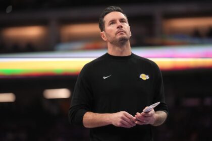 Jan 12, 2026; Sacramento, California, USA; Los Angeles Lakers head coach JJ Redick stands on the court during a timeout against the Sacramento Kings in the second quarter at the Golden 1 Center. Mandatory Credit: Cary Edmondson-Imagn Images