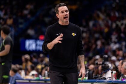 Jan 6, 2026; New Orleans, Louisiana, USA; Los Angeles Lakers Head Coach JJ Redick reacts to a play against the New Orleans Pelicans during the second half at Smoothie King Center. Mandatory Credit: Stephen Lew-Imagn Images