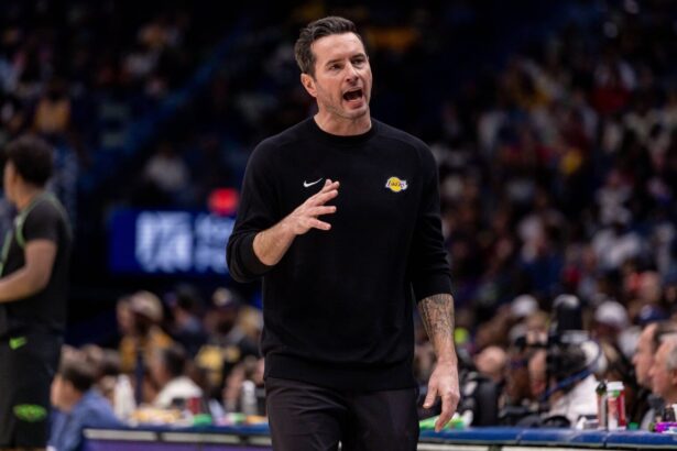 Jan 6, 2026; New Orleans, Louisiana, USA; Los Angeles Lakers Head Coach JJ Redick reacts to a play against the New Orleans Pelicans during the second half at Smoothie King Center. Mandatory Credit: Stephen Lew-Imagn Images