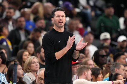 Jan 7, 2026; San Antonio, Texas, USA; Los Angeles Lakers Head Coach JJ Redick looks on in the first half against the San Antonio Spurs at Frost Bank Center. Mandatory Credit: Daniel Dunn-Imagn Images