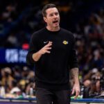 Los Angeles Lakers Head Coach JJ Redick reacts to a play against the New Orleans Pelicans during the second half at Smoothie King Center.