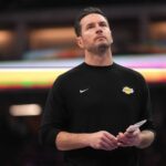 Los Angeles Lakers head coach JJ Redick stands on the court during a timeout against the Sacramento Kings in the second quarter at the Golden 1 Center.