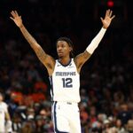 Memphis Grizzlies guard Ja Morant (12) reacts against the Phoenix Suns during the second half at the Mortgage Matchup Center.