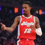 Jan 27, 2025; New York, New York, USA; Memphis Grizzlies guard Ja Morant (12) reacts during the first half against the New York Knicks at Madison Square Garden. Mandatory Credit: Vincent Carchietta-Imagn Images
