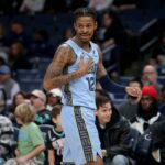 Jan 21, 2026; Memphis, Tennessee, USA; Memphis Grizzlies guard Ja Morant (12) reacts during the first quarter against the Atlanta Hawks at FedExForum. Mandatory Credit: Petre Thomas-Imagn Images