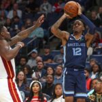Oct 24, 2025; Memphis, Tennessee, USA; Memphis Grizzlies guard Ja Morant (12) shoots during the third quarter against the Miami Heat at FedExForum. Mandatory Credit: Petre Thomas-Imagn Images