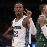 Memphis Grizzlies guard Ja Morant (12) gestures during the third quarter against the Milwaukee Bucks at FedExForum.