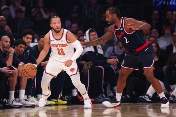 Jan 7, 2026; New York, New York, USA; New York Knicks guard Jalen Brunson (11) is guarded by LA Clippers forward Kawhi Leonard (2) during the first quarter at Madison Square Garden. Mandatory Credit: Vincent Carchietta-Imagn Images