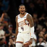 Nov 6, 2025; Phoenix, Arizona, USA; Phoenix Suns guard Jalen Green (4) celebrates against the Los Angeles Clippers at the Mortgage Matchup Center. Mandatory Credit: Mark J. Rebilas-Imagn Images