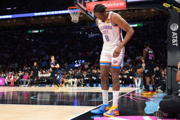 Jan 17, 2026; Miami, Florida, USA; Oklahoma City Thunder guard Jalen Williams (8) grabs the back of his right leg after a play against the Miami Heat during the second quarter at Kaseya Center. Mandatory Credit: Sam Navarro-Imagn Images