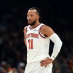 Jan 9, 2026; Phoenix, Arizona, USA; New York Knicks guard Jalen Brunson (11) against the Phoenix Suns at Mortgage Matchup Center. Mandatory Credit: Mark J. Rebilas-Imagn Images