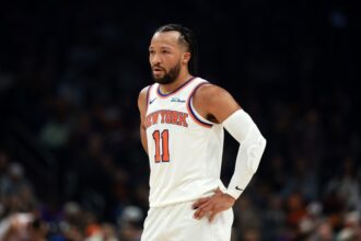 Jan 9, 2026; Phoenix, Arizona, USA; New York Knicks guard Jalen Brunson (11) against the Phoenix Suns at Mortgage Matchup Center. Mandatory Credit: Mark J. Rebilas-Imagn Images