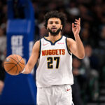 Jan 14, 2026; Dallas, Texas, USA; Denver Nuggets guard Jamal Murray (27) brings the ball up court against the Dallas Mavericks during the first quarter at the American Airlines Center. Mandatory Credit: Jerome Miron-Imagn Images