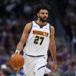Jan 29, 2026; Denver, Colorado, USA; Denver Nuggets guard Jamal Murray (27) controls the ball in first quarter against the Brooklyn Nets at Ball Arena. Mandatory Credit: Ron Chenoy-Imagn Images