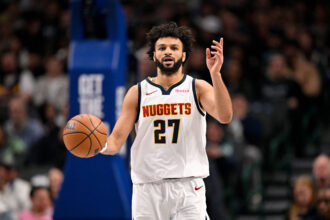 Jan 14, 2026; Dallas, Texas, USA; Denver Nuggets guard Jamal Murray (27) brings the ball up court against the Dallas Mavericks during the first quarter at the American Airlines Center. Mandatory Credit: Jerome Miron-Imagn Images