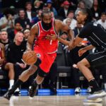 Jan 25, 2026; Inglewood, California, USA; Los Angeles Clippers guard James Harden (1) moves to the basket against Brooklyn Nets' Ziaire Williams (1) during the first half at Intuit Dome. Mandatory Credit: Gary A. Vasquez-Imagn Images