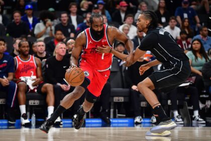 Jan 25, 2026; Inglewood, California, USA; Los Angeles Clippers guard James Harden (1) moves to the basket against Brooklyn Nets' Ziaire Williams (1) during the first half at Intuit Dome. Mandatory Credit: Gary A. Vasquez-Imagn Images
