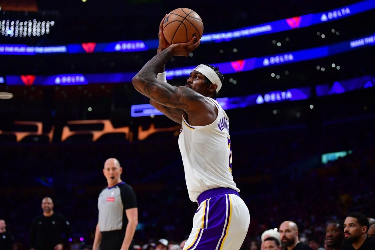 Dec 25, 2025; Los Angeles, California, USA; Los Angeles Lakers forward Jarred Vanderbilt (2) shoots three point basket against the Houston Rockets during the first half at Crypto.com Arena. Mandatory Credit: Gary A. Vasquez-Imagn Images