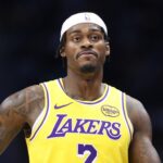 Nov 10, 2025; Charlotte, North Carolina, USA; Los Angeles Lakers forward Jarred Vanderbilt (2) walks down the court during the second half against the Charlotte Hornets at Spectrum Center. Mandatory Credit: Brian Westerholt-Imagn Images