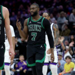 Jan 1, 2026; Sacramento, California, USA; Boston Celtics forward Jaylen Brown (7) signals for a replay after getting fouled out during the fourth quarter at Golden 1 Center. Mandatory Credit: Dennis Lee-Imagn Images