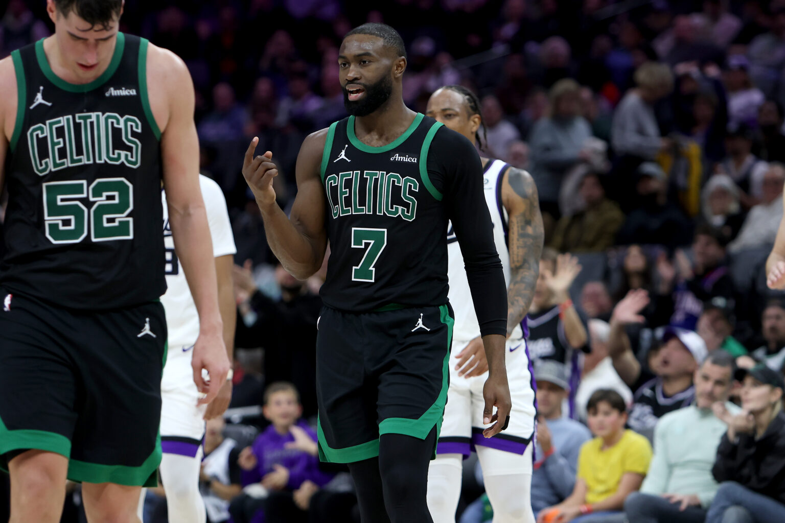 Jan 1, 2026; Sacramento, California, USA; Boston Celtics forward Jaylen Brown (7) signals for a replay after getting fouled out during the fourth quarter at Golden 1 Center. Mandatory Credit: Dennis Lee-Imagn Images
