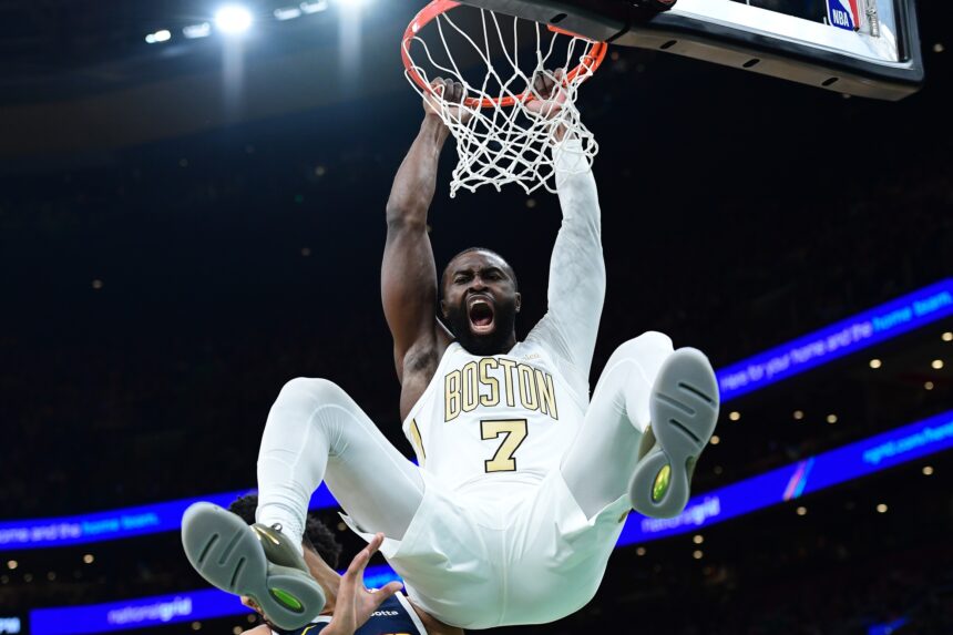 Jan 7, 2026; Boston, Massachusetts, USA; Boston Celtics guard Jaylen Brown (7) dunks the ball during the first half against the Denver Nuggets at TD Garden. Mandatory Credit: Bob DeChiara-Imagn Images