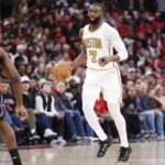 Boston Celtics guard Jaylen Brown (7) brings the ball up court against the Chicago Bulls during the second half at United Center.