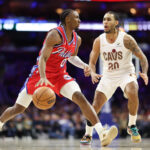 Jan 16, 2026; Philadelphia, Pennsylvania, USA; Philadelphia 76ers guard Tyrese Maxey (0) controls the ball agains Cleveland Cavaliers guard Jaylon Tyson (20) during the second quarter at Xfinity Mobile Arena. Mandatory Credit: Bill Streicher-Imagn Images
