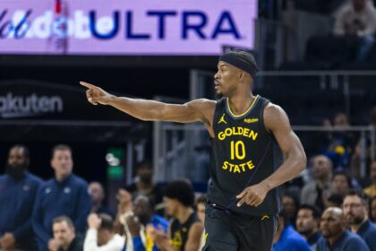 Dec 20, 2025; San Francisco, California, USA; Golden State Warriors forward Jimmy Butler III (10) reacts after scoring against the Phoenix Suns during the first quarter at Chase Center. Mandatory Credit: John Hefti-Imagn Images