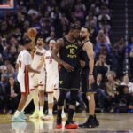 Jan 19, 2026; San Francisco, California, USA; Golden State Warriors forward Jimmy Butler III (10) and guard Stephen Curry (30) react after Butler misses a shot at the buzzer during the first quarter against the Miami Heat at Chase Center. Mandatory Credit: Kelley L Cox-Imagn Images