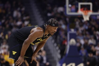 Jan 19, 2026; San Francisco, California, USA; Golden State Warriors forward Jimmy Butler III (10) between plays against the Miami Heat during the first quarter at Chase Center. Mandatory Credit: Kelley L Cox-Imagn Images