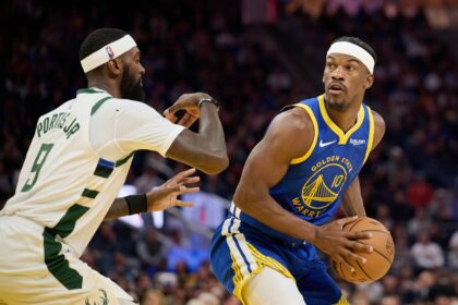 Golden State Warriors forward Jimmy Butler III (10) looks to pass the ball against Milwaukee Bucks forward Bobby Portis (9) during the third quarter at Chase Center.