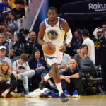 Oct 5, 2025; San Francisco, California, USA; Golden State Warriors forward Jonathan Kuminga (1) dribbles upcourt against the Los Angeles Lakers in the third quarter at Chase Center. Mandatory Credit: David Gonzales-Imagn Images
