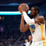 Dec 2, 2025; San Francisco, California, USA; Golden State Warriors forward Jonathan Kuminga (1) shoots the ball against the Oklahoma City Thunder in the first quarter at the Chase Center. Mandatory Credit: Cary Edmondson-Imagn Images