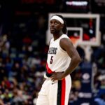 Nov 12, 2025; New Orleans, Louisiana, USA; Portland Trail Blazers guard Jrue Holiday (5) looks on against the New Orleans Pelicans during the second half at Smoothie King Center. Mandatory Credit: Stephen Lew-Imagn Images
