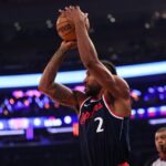 Jan 7, 2026; New York, New York, USA; LA Clippers forward Kawhi Leonard (2) shoots the ball against the New York Knicks during the first quarter at Madison Square Garden. Mandatory Credit: Vincent Carchietta-Imagn Images