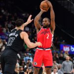 Jan 25, 2026; Inglewood, California, USA; Los Angeles Clippers forward Kawhi Leonard (2) shoots against Brooklyn Nets forward Michael Porter Jr. (17) during the first half at Intuit Dome. Mandatory Credit: Gary A. Vasquez-Imagn Images