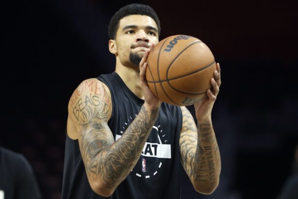 Dec 6, 2025; Miami, Florida, USA; Miami Heat center Kel'el Ware (7) warms up against the Sacramento Kings before the game at Kaseya Center. Mandatory Credit: Rhona Wise-Imagn Images