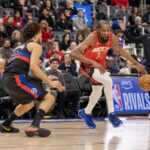 Jan 23, 2026; Detroit, Michigan, USA; Detroit Pistons guard Cade Cunningham (2) defends against Houston Rockets forward Kevin Durant (7) during the first half at Little Caesars Arena. Mandatory Credit: David Reginek-Imagn Images