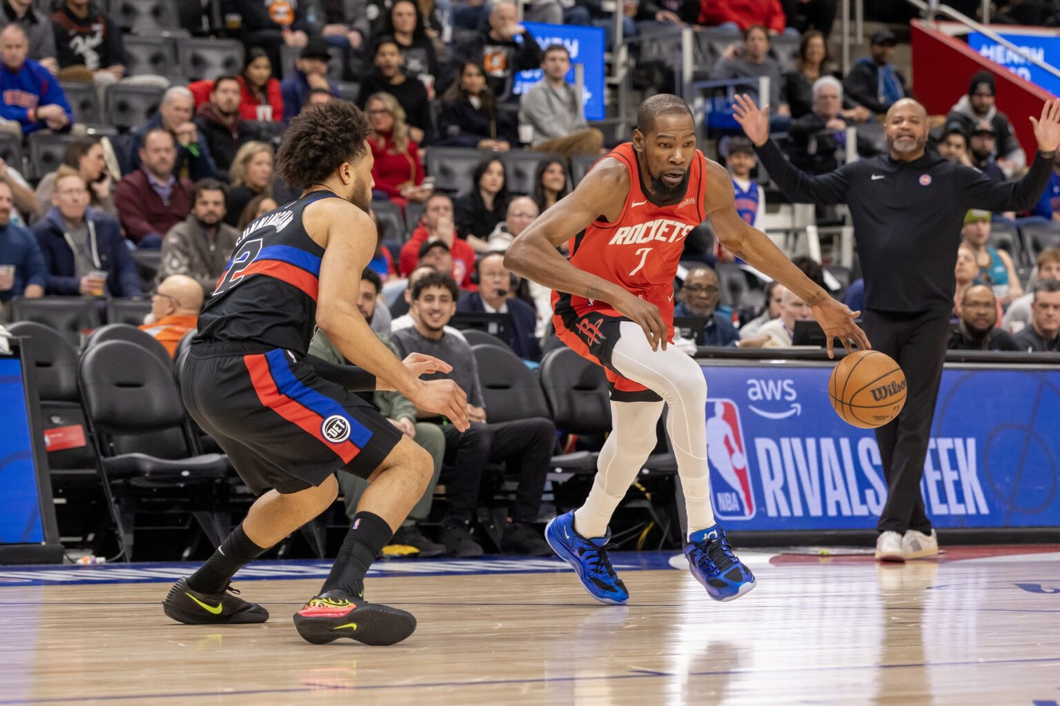 Jan 23, 2026; Detroit, Michigan, USA; Detroit Pistons guard Cade Cunningham (2) defends against Houston Rockets forward Kevin Durant (7) during the first half at Little Caesars Arena. Mandatory Credit: David Reginek-Imagn Images