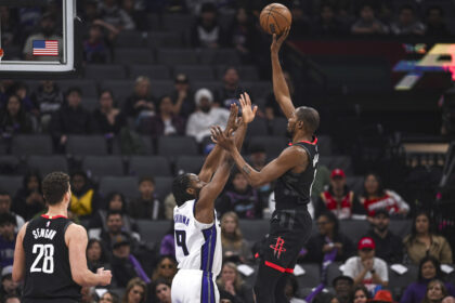 Jan 11, 2026; Sacramento, California, USA; Houston Rockets forward Kevin Durant (7) shoots over Sacramento Kings forward Precious Achiuwa (9) during the first quarter at Golden 1 Center. Mandatory Credit: Justine Willard-Imagn Images