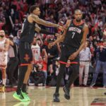 Jan 5, 2026; Houston, Texas, USA; Houston Rockets forward Jabari Smith Jr. (10) celebrates forward Kevin Durant (7) three point winning basket against the Phoenix Suns in the fourth quarter at Toyota Center. Mandatory Credit: Thomas Shea-Imagn Images