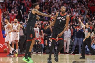 Jan 5, 2026; Houston, Texas, USA; Houston Rockets forward Jabari Smith Jr. (10) celebrates forward Kevin Durant (7) three point winning basket against the Phoenix Suns in the fourth quarter at Toyota Center. Mandatory Credit: Thomas Shea-Imagn Images